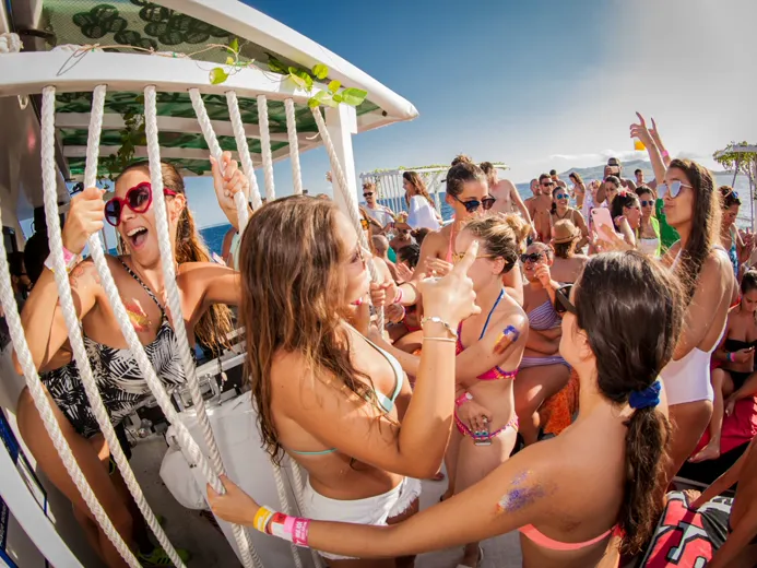Boat party crowd off Ibiza
